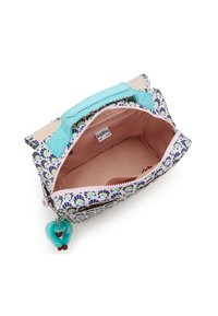Komfortable Reißverschlusstasche mit einem floralen Druck in Blau, Grün und Pink, mit einem strukturierten türkisfarbenen Griff und einem Pom-Pom-Anhänger.