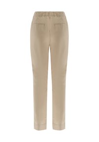 Beige Hose mit elastischem Bund, zwei Gesäßtaschen und einem schmal zulaufenden Bein. Glatte Textur und einfarbig ohne Muster.