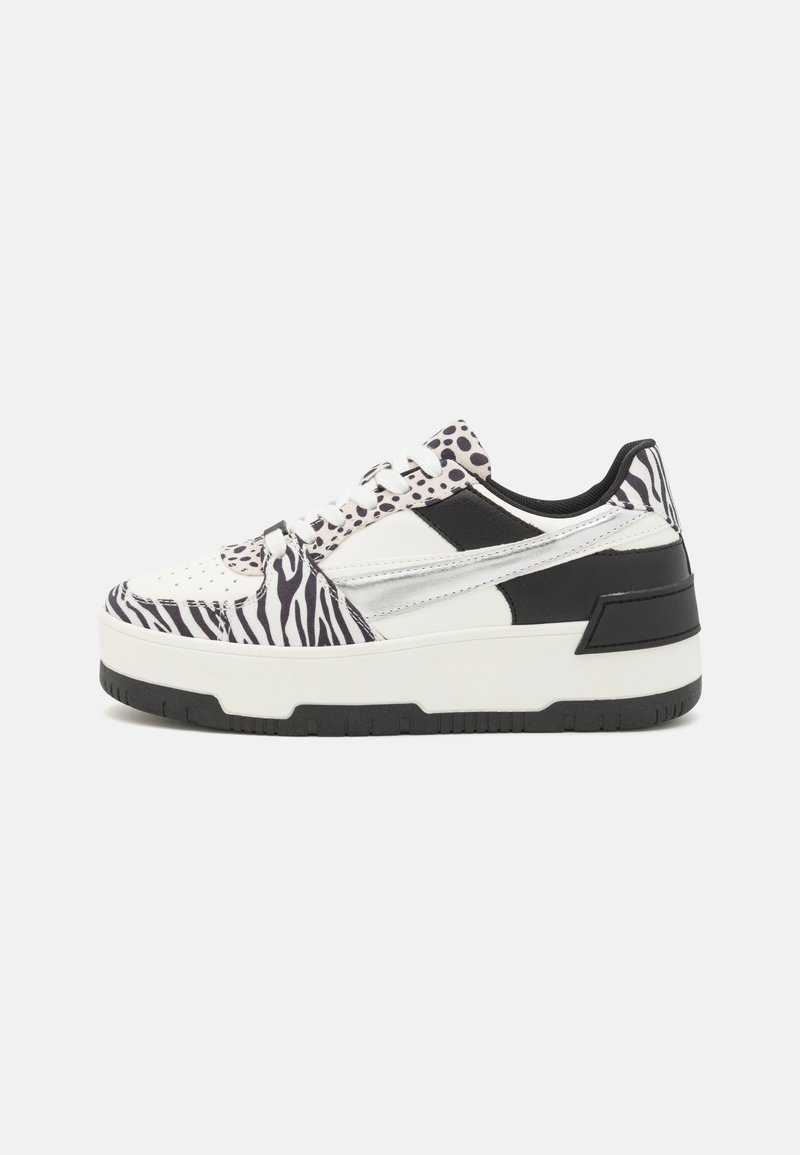 Sneakers with a platform sole, featuring a mix of white, black, and zebra print designs. Material includes synthetic and smooth textures.