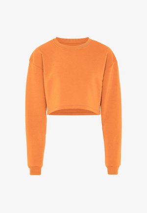 Narancssárga, rövidített pulóver hosszú ujjakkal, kerek nyakkivágással és bordázott mandzsettákkal. Az anyag lágy és sima textúrájúnak tűnik.