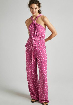 Mono rosa con estampado, de cuello halter, cintura elástica y diseño de pierna ancha, con formas de diamante y un cinturón atado como adorno.