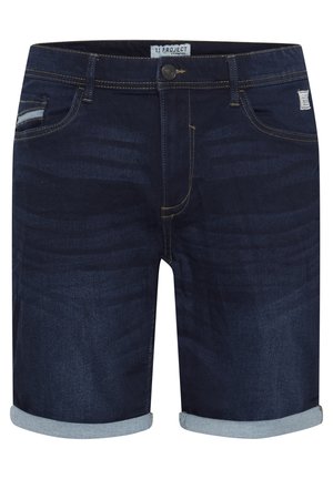 Temno modri traper kratki hlače z svetlo modrim zavihkom. Vsebujejo subtilno teksturo in podrobnosti šivanja, sprednje žepke in gumbasto zapiranje.