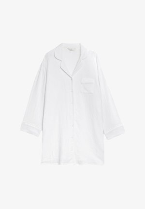 Camicia da pigiama bianca in cotone con maniche lunghe, colletto a V e taschino sul petto. Caratterizzata da un tessuto testurizzato e chiusura con bottoni.