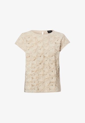 Beige blouse met korte mouwen, voorzien van een gestructureerd 3D bloemmotief en een ronde halslijn, met een kleine knoopsluiting aan de achterkant.