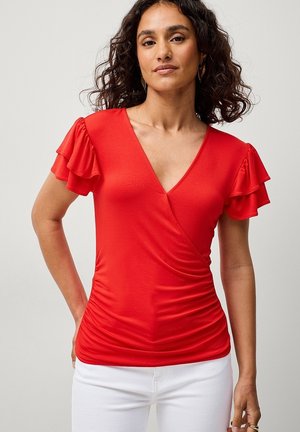 Rode wikkeltop met korte ruchemouwen, een diepe V-hals en geplooide zijkanten voor een getailleerd silhouet. Gemaakt van een gladde, rekbare stof.
