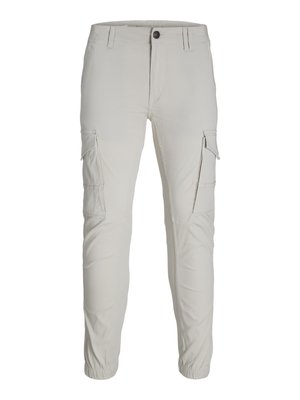 Beige Cargo-Hosen mit elastischen Bündchen, zwei Seitentaschen und einem Knopfverschluss, aus weichem, strapazierfähigem Stoff gefertigt.