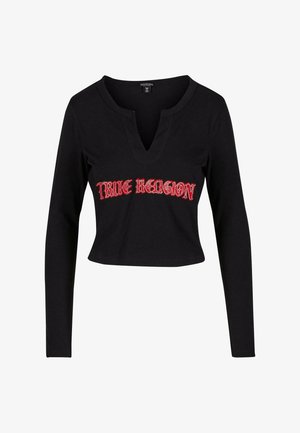Melna ilgām piedurknēm crop top blūze ar V-veida kakla izgriezumu un "TRUE RELIGION" rakstu sarkaniem kristāliem uz priekšpuses. Mīksta auduma, pieguļoša forma.