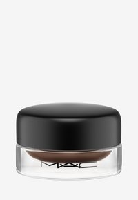 Braune Creme in einem klaren Glasbehälter mit einem schwarzen, glatten Deckel; beschriftet mit "MAC" in schwarzer Schrift auf der Vorderseite.