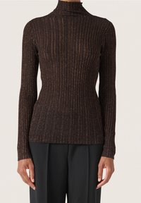 Mörk, ribbad långärmad topp med en ståkrage. Materialet har en glittrig textur i svart och kopparnyanser. Tätsittande silhuett.