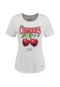 T-shirt en coton blanc avec un imprimé graphique de cerises rouges avec des feuilles vertes et le texte "Aimez les cerises pour la vie" en lettres grasses.