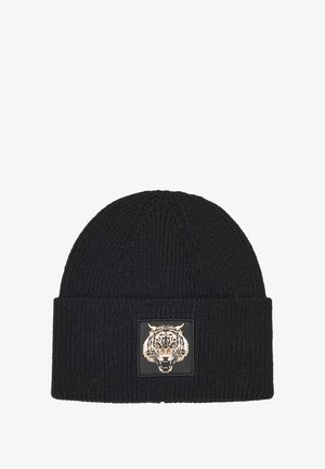 Gorro de punto negro con textura acanalada, que presenta un parche cuadrado en la parte frontal con la cabeza de un tigre en negro y dorado.