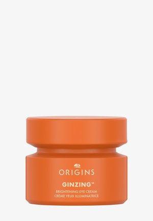 Origins GinZing verhelderende oogcrème in een oranje potje met een afgeronde deksel, voorkant label zichtbaar op een witte achtergrond.