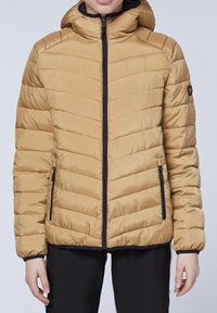 Tan puffer jacket with a hood, featuring horizontal quilting, black zipper, and side pockets. The cuffs are elasticized for a snug fit.