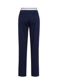 Navy blue pinstriped trousers with a white elastic waistband, straight-leg design, two back pockets, and smooth fabric texture.