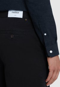Farah NORWOOD  - Pantalon classique - black