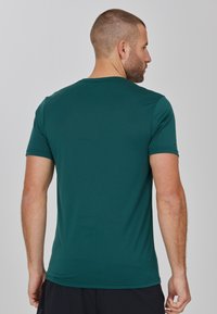 Endurance S/S PERFORMANCE - Sport T-shirt - bistro green