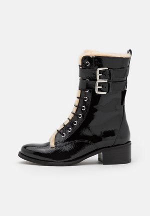 Bottines à lacets - black
