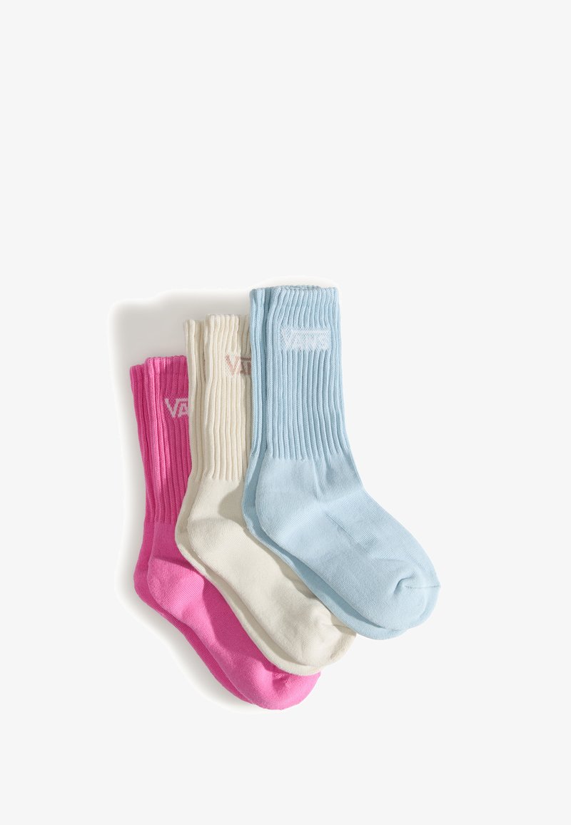 Trois paires de chaussettes montantes côtelées en rose, crème et bleu clair, chacune avec un logo Vans près du bord.
