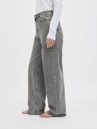 Wide-leg jeans in faded gray denim, high-waisted with a button closure, featuring subtle stitching, and a relaxed fit down to the ankles.