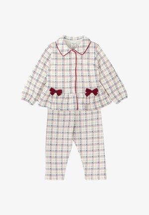 Ensemble de pyjama deux pièces blanc avec un motif à carreaux rouge et bleu, comprenant un haut boutonné avec col et volant, et un pantalon ajusté avec des nœuds.