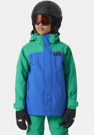 Chaqueta de esquí colorida en azul y verde, con un cuello alto, capucha ajustable y bolsillos con cremallera. Guantes negros con acentos de logotipo.