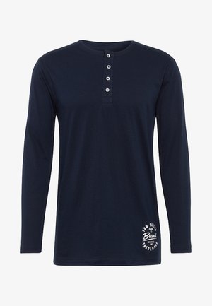 Marineblauwe lange mouwen t-shirt van katoen, met een henley-halslijn met vijf knopen en een logo-opdruk in het wit aan de onderkant.