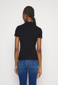 Tommy Jeans SLIM ESSENTIAL - Polo - black