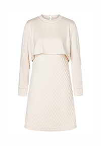Beige Kleid mit einem geschichteten Design, einem weichen Oberteil und strukturiertem Stoff im Rock. Lange Ärmel und ein Knopfverschluss auf der Rückseite.