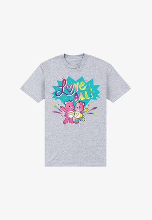 T-shirt in cotone grigio chiaro con due orsetti rosa che tengono un lecca-lecca arcobaleno. La scritta recita "Ama TUTTI!" su uno sfondo turchese brillante.