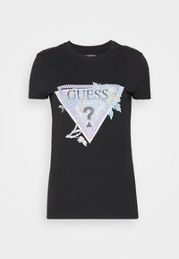 Czarny bawełniany t-shirt z trójkątną grafiką przedstawiającą kwiatowy wzór oraz napisem "GUESS® USA" w srebrnych i pastelowych kolorach.