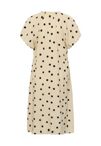 Robe midi beige à pois noirs, manches courtes bouffantes et encolure large froncée, vue de dos.