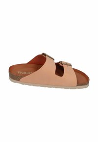 Pink leather slide sandal with two adjustable straps, cork footbed, and a rubber outsole. Smooth texture and minimalistic design.