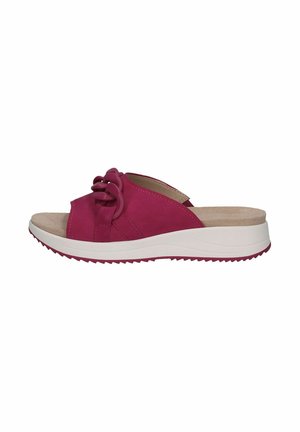 Sandales à glissière fuchsia avec une texture en suede lisse, dotées d'un accent noué et d'une semelle blanche crantée pour l'adhérence et le confort.