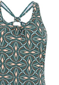 Uimapuku, jossa on turkoosi, persikka ja musta geometrinen kuvio, ristikkäiset hihnat ja keskellä yläselkää solmukoriste.