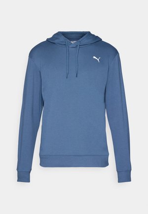 Sweatshirt à capuche bleu en tissu doux. Il présente une poche kangourou, des poignets côtelés et un logo Puma blanc sur la poitrine.
