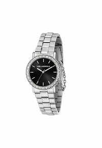 Zilveren bracelet horloge met een ronde zwarte wijzerplaat, met kristallen accentrand en glanzende schakels. Voorzien van witte uur markers en wijzers.