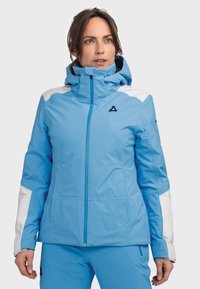 Hellblaue isolierte Jacke mit Kapuze, ausgestattet mit weißen Akzenten an Schultern und Ärmeln, Reißverschluss und einem Logo auf der Brust.