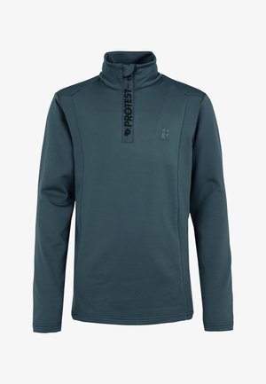 Fleece half-zip trui in donker teal met een hoge kraag, gebrandmerkte rits en een klein logo detail op de borst. Zachte, gladde textuur.
