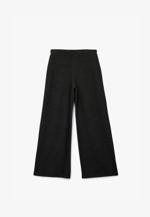 Spodnie o szerokich nogawkach z ciemnoszarego materiału, z prostym krojem, gładką teksturą i elastycznym pasem.