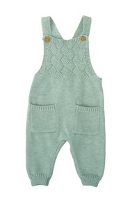 Pichi de punto en verde menta, con un patrón de cruces texturizado en el peto, botones de madera y dos bolsillos frontales con puños acanalados.