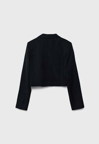 Blazer noir coupé court avec manches longues et col, présenté à plat de dos sur un fond gris clair uni.