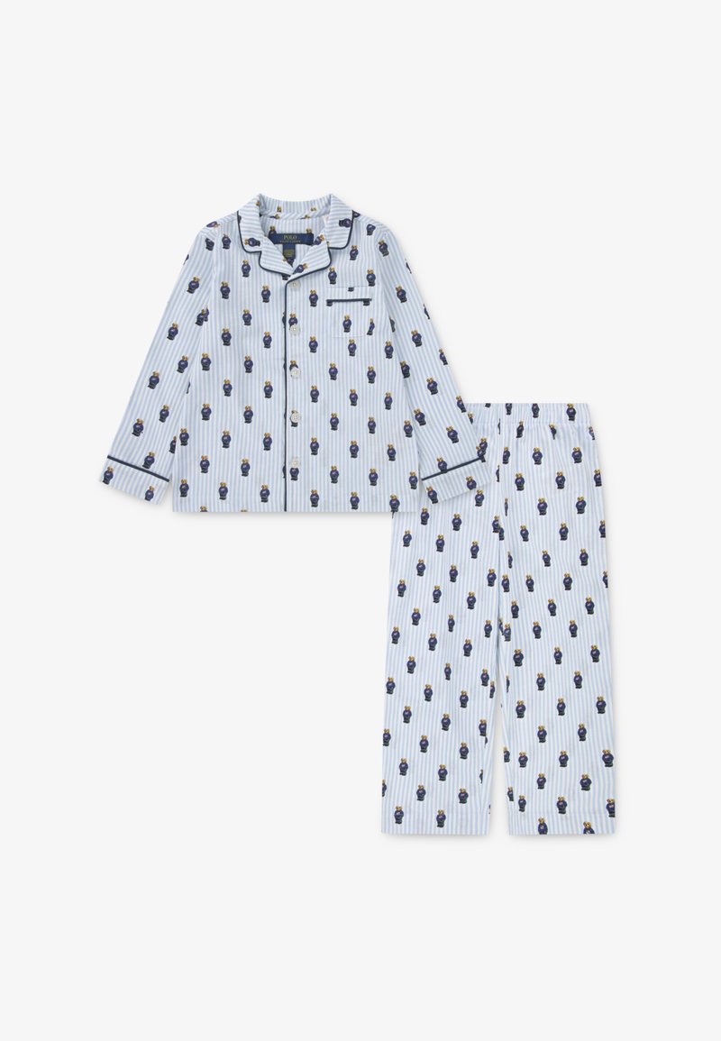 Vaaleansininen puuvillainen pyjama, jossa pystysuoria valkoisia raitoja ja pieniä sarjakuvahahmoja. Mukana nappikiinnitteinen paita ja housut.