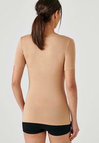 Damart MANCHES COURTES INVISIBLE THERMOLACTYL - Camiseta básica - ambre