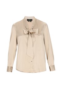Beige satinbluse med lange ærmer og et sløjfebånd ved halsen. Har knaplukning og manchetter lavet af det samme satinmateriale.