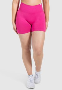 Fitte, hoge taille shorts in felle roze, gemaakt van rekbare stof, met een gladde textuur en een geribde tailleband voor extra comfort.