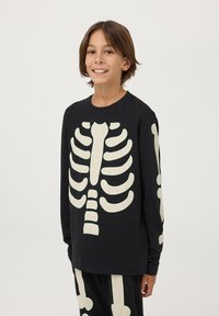 Terranova SET CON SCHELETRO CHE SI ILLUMINA - Pigiama - nero