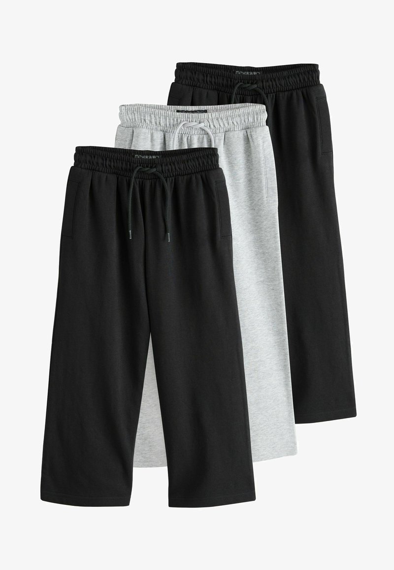 Three pairs of shorts: one black, one dark gray, and one light gray. Made of soft cotton, featuring an elastic waistband with drawstring and pockets.
