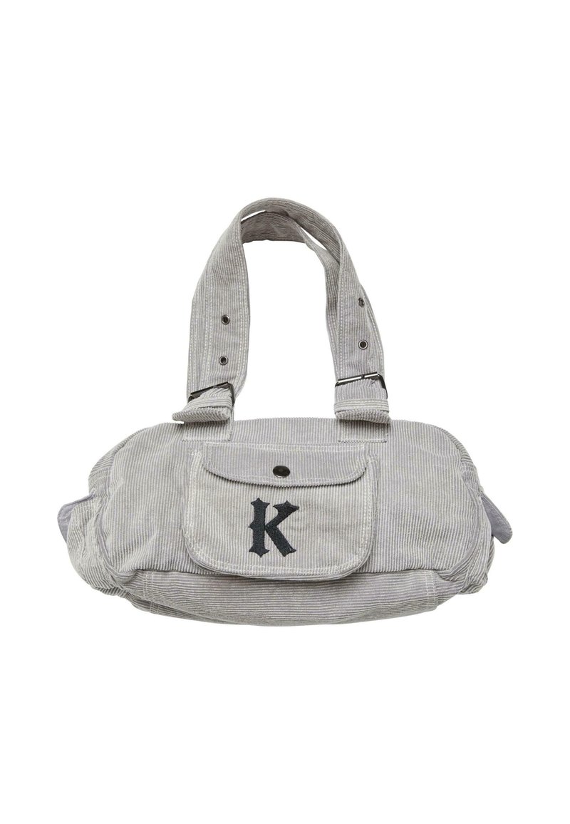 Borsa in corduroy grigio con due manici corti, una tasca frontale e una grande lettera nera "K". Presenta una chiusura con bottone e materiale testurizzato.