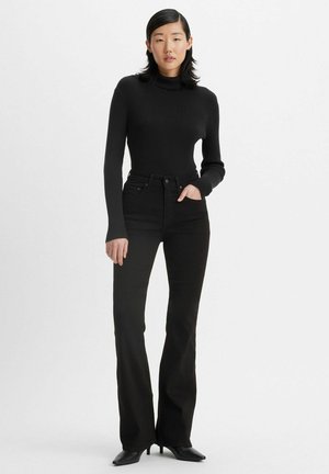 726™ HIGH RISE FLARE JEANS - Flared Jeans - night is black