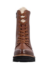 Bruine leren boot met een gestructureerde afwerking, vetersluiting en een pluizige crème kleurige voering bij de kraag. Voorzien van ronde veters en een rubberen zool.
